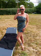 Outdoor posing from an edgy older lady with a mohawk