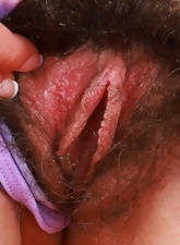 Naughty Latina woman with an extremely hairy pussy