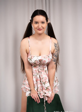 Hairy Tattooed Milf Undressing On Chair Photos